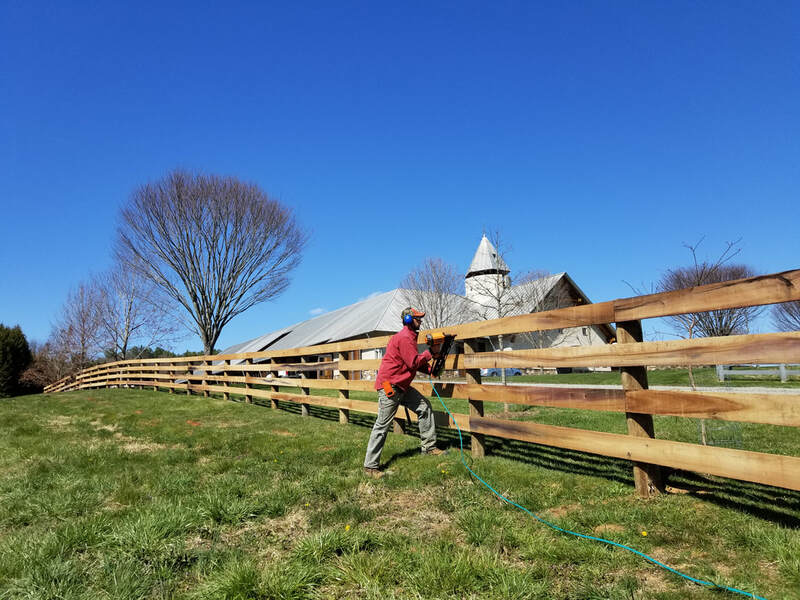 The Virginia Fence Company wood board fencing